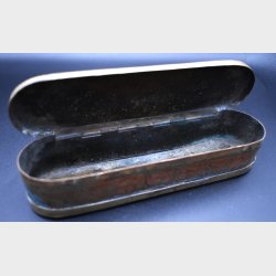 Antique engraved metal case with figural decoration