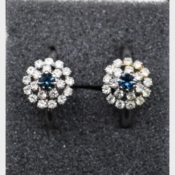 Elegant vintage-inspired jewelry set consisting of a matching ring and pair of stud earrings