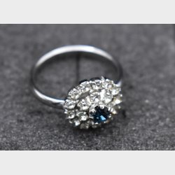 Elegant vintage-inspired jewelry set consisting of a matching ring and pair of stud earrings