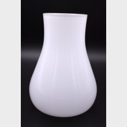 Elegant minimalist white glass vase with a soft, organic silhouette