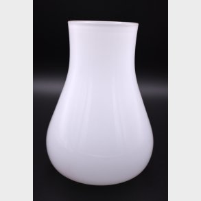 Elegant minimalist white glass vase with a soft, organic silhouette