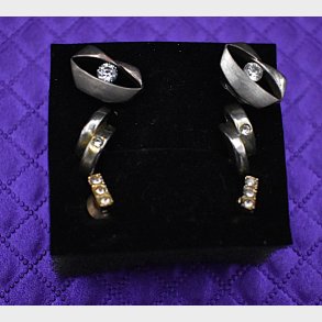Elegant mixed set of vintage-style stud earrings, featuring three coordinated pairs presented together.