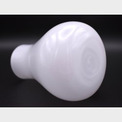 Elegant minimalist white glass vase with a soft, organic silhouette