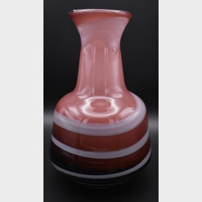 Decorative art glass vase in a striking red and white color combination