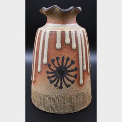 Handmade studio pottery vase with a rustic and expressive design