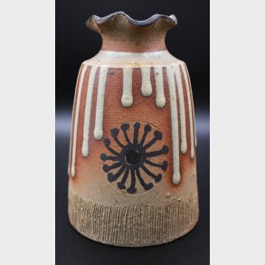 Handmade studio pottery vase with a rustic and expressive design
