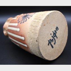 Handmade studio pottery vase with a rustic and expressive design