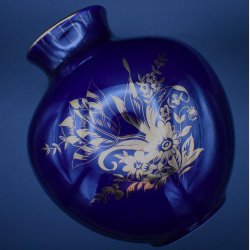 Beautiful mid-century Danish art pottery vase by S�holm, Denmark, featuring a rich cobalt blue glaze